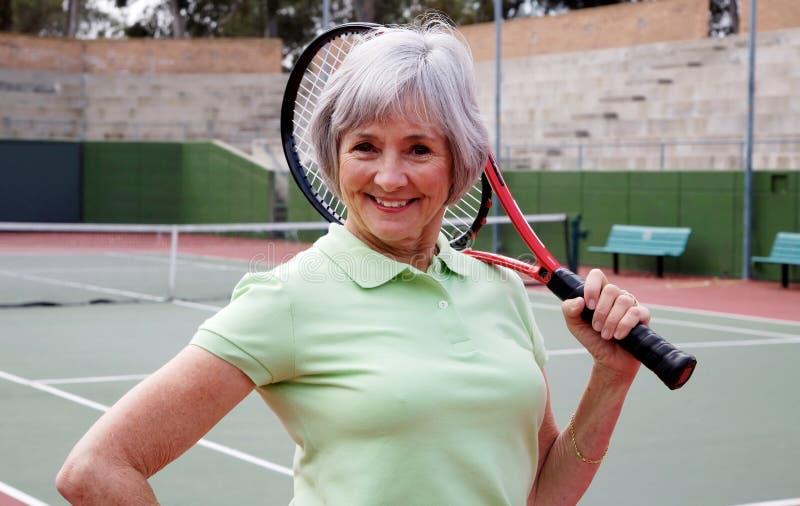 Senior Playing Tennis stock image. Image of grandparent 4801093