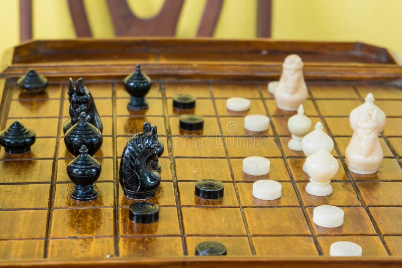 Local Thai people play old traditional Thai chess in public area - slow  life style local people with chess board game concept Stock Photo