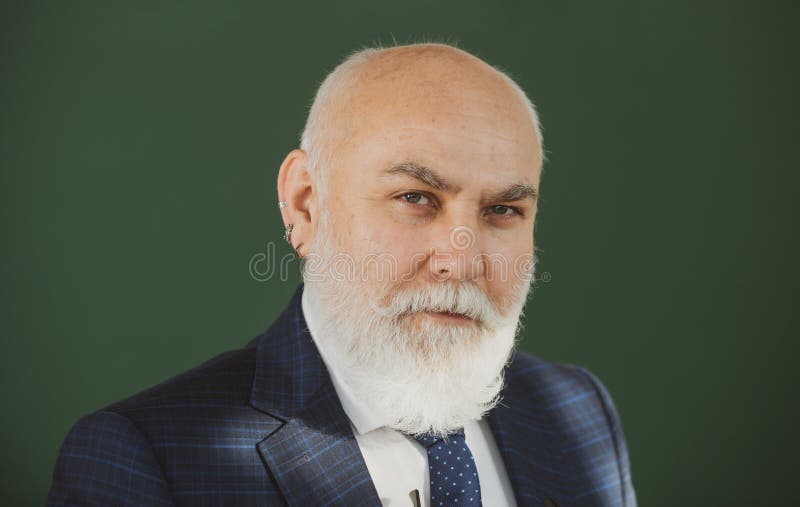 Senior man thinking about his next move in a game of chess Stock Photo by  dmytros9