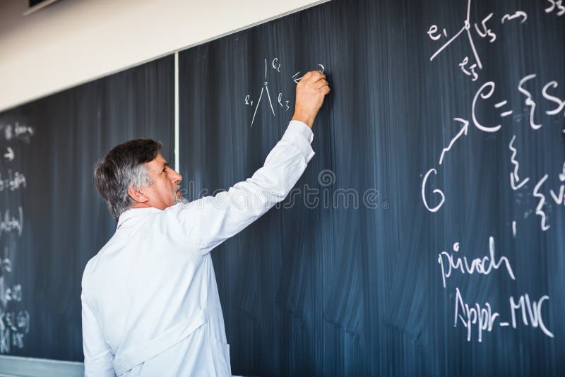 Senior professor writing on the board
