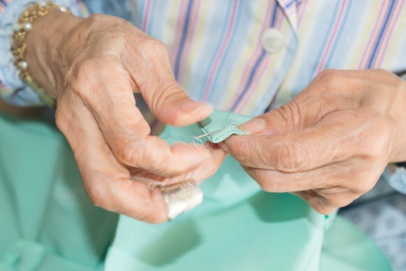 Senior sewing stock image. Image of aged, arthritis, retired 61535331