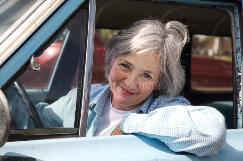 Smiling senior taking a cruise in the old rustbucket. Old granny stock images, royalty-free photos and pictures