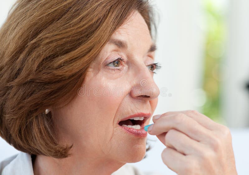 Senior Taking Pills at Home Stock Photo Image of care, senior 18108072