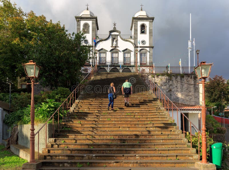 Beautiful view of senior tourists visiting the Igreja de Nossa Senhora do Monte church in Funchal on the island Madeira. Beautiful view of senior tourists visiting the Igreja de Nossa Senhora do Monte church in Funchal on the island Madeira