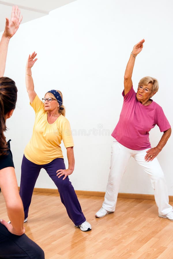 Senior woman in aerobic session. stock photos Senior woman in aerobic session. stock photos