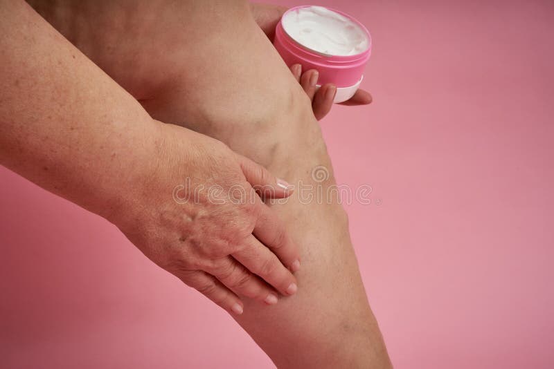 Legs Of Senior Woman With Varicose Veins On Coral Background Stock Image Image Of Health