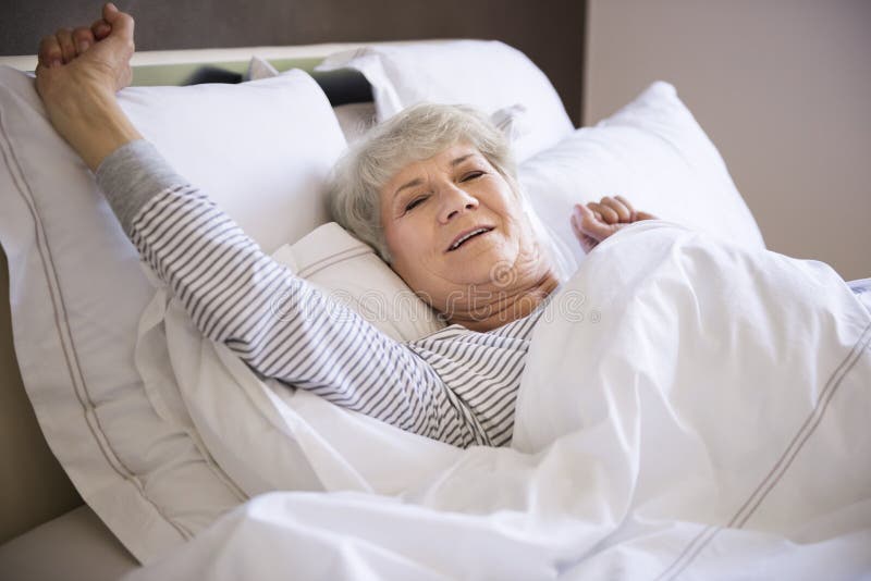 Senior Woman In Bed Stock Image Image Of Comfortable 56598301