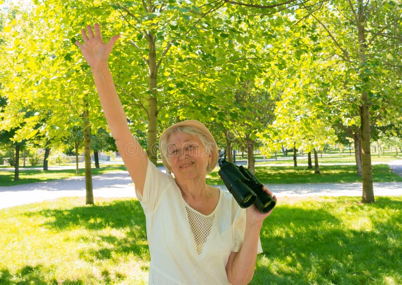 Senior Woman with Binoculars in Park Stock Image Image of face