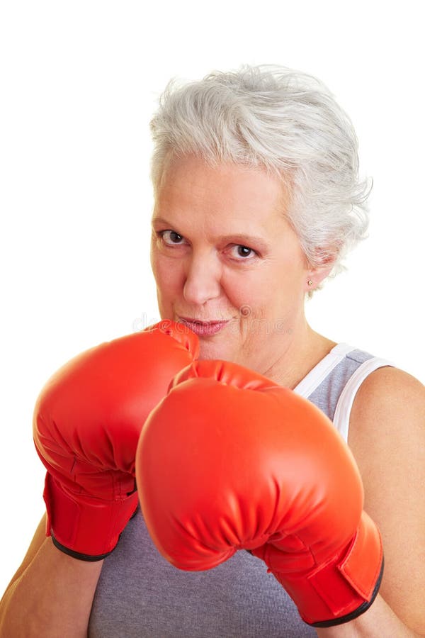 Senior woman with boxing gloves