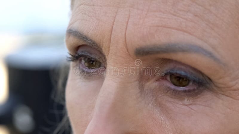 Senior woman crying, praying for peace, war victim, depression and apathy stock photos Senior woman crying, praying for peace, war victim, depression and apathy stock photos