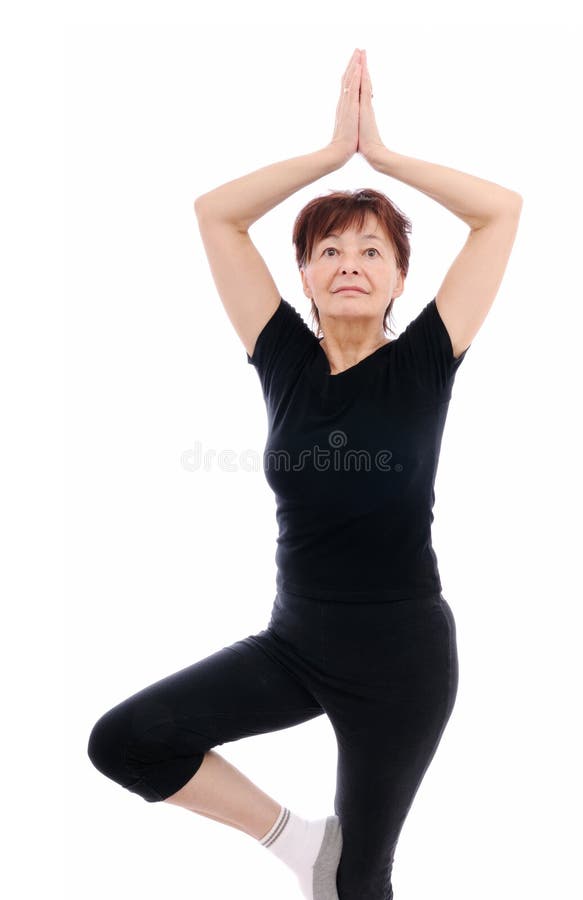 Senior woman exercises yoga royalty free stock image Senior woman exercises yoga royalty free stock image