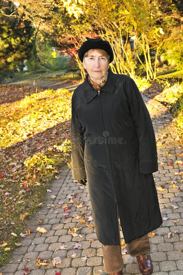 Senior woman gardening stock photo. Image of flowerpot - 2370130