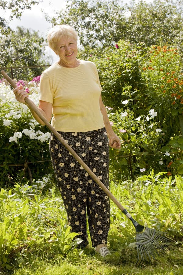 Senior woman in the garden stock image Senior woman in the garden stock image