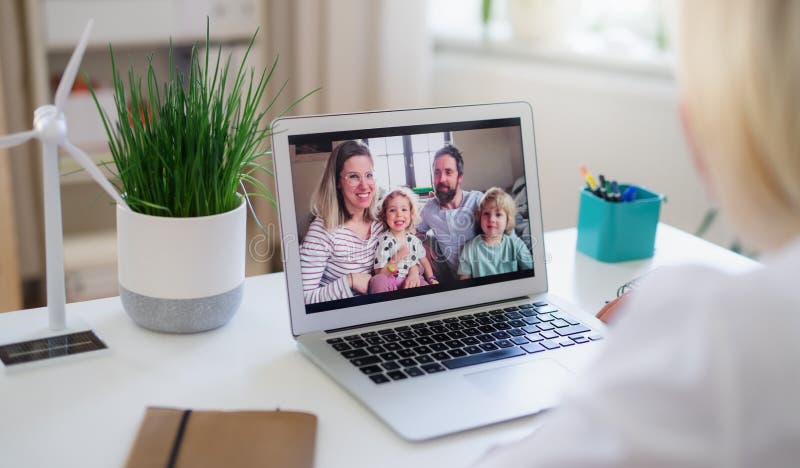 Senior woman with laptop indoors at home, family video call concept. stock photos Senior woman with laptop indoors at home, family video call concept. stock photos