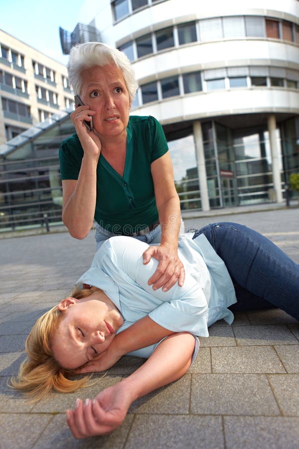 Senior woman making emergency call stock photo Senior woman making emergency call stock photo
