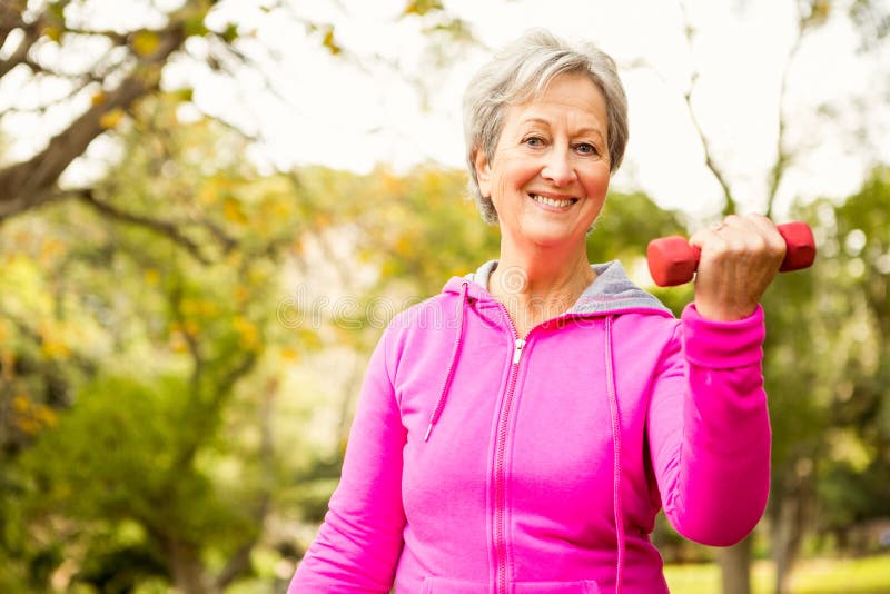 Senior woman in the park royalty free stock images Senior woman in the park royalty free stock images