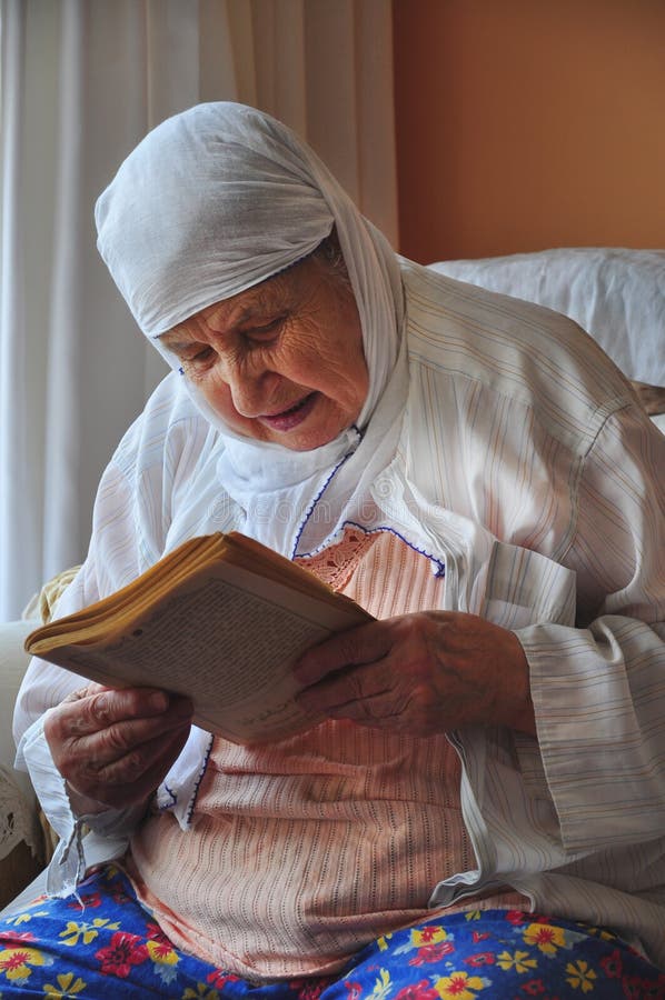 Senior woman praying stock photo Senior woman praying stock photo