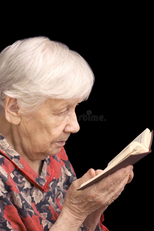 Senior woman reads the book