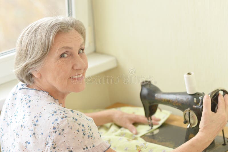 Senior Woman at Sewing Machine Stock Photo Image of retired, home 37666712