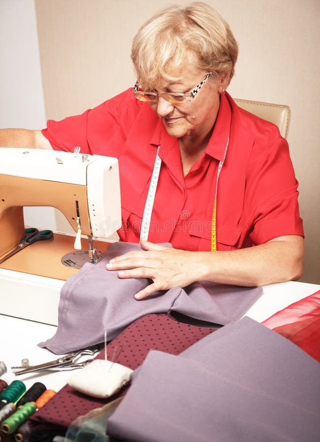 Senior Woman Sewing on a Sewing Machine Stock Photo Image of figure