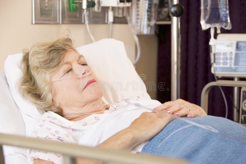 Senior Woman Sleeping In Hospital Bed Stock Photo - Image 