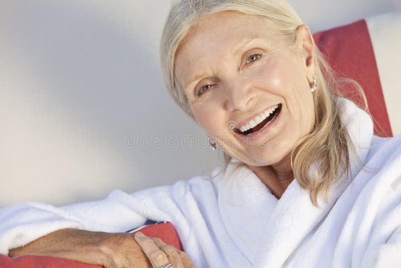 Senior Woman in White Bathrobe Stock Photo Image of bathrobe, orange
