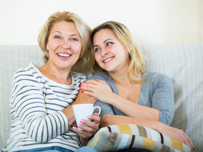 Portrait Of Happy Mature Mother And Young Daughter At Home Stock Image Image Of People