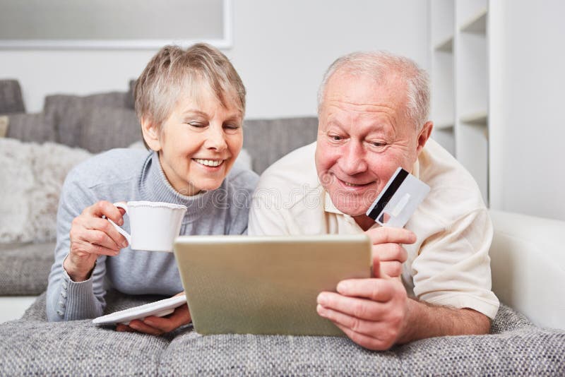 Seniors as couple on the couch royalty free stock image Seniors as couple on the couch royalty free stock image