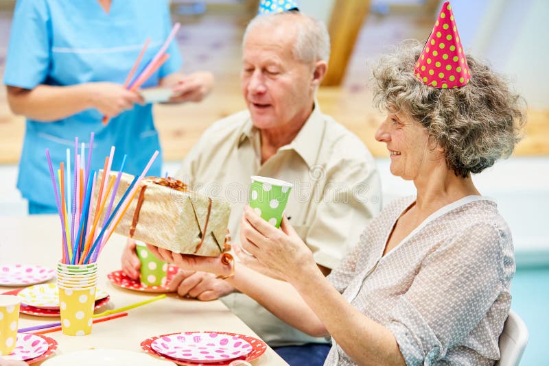 Seniors celebrate a party at the retirement home