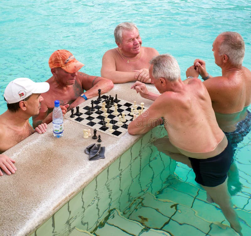Seniors playing chess at Szechenyi thermal bath in Budapest, Hun royalty free stock photos Seniors playing chess at Szechenyi thermal bath in Budapest, Hun royalty free stock photos