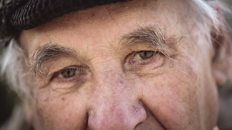 Seniors portrait, sad elderly man looking at camera