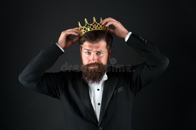 Sense of self importance. Big boss. King crown. Egoist concept. Businessman in tailored tuxedo and crown. Very important