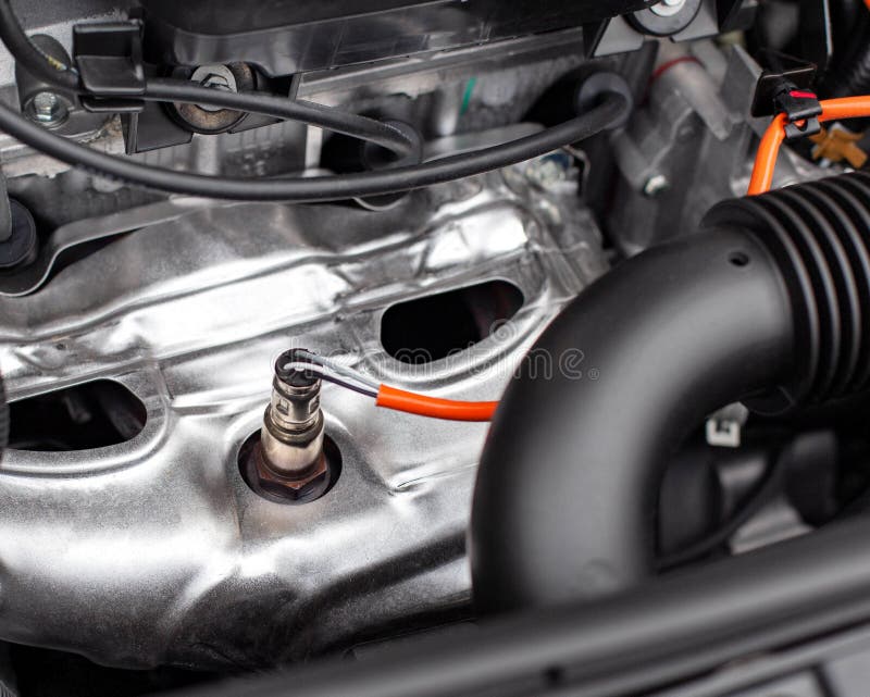 Sensor lambda probe in an internal combustion engine in the engine compartment. Estimation of residual oxygen in exhaust gases royalty free stock photo