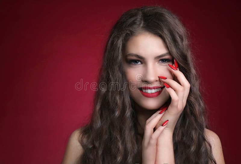 Sensual Beautiful Woman Posing In Red Dress Girl With Long Curly Hair 