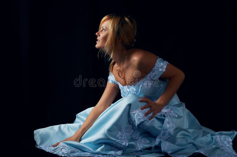 Sensual fiancee in blue dress