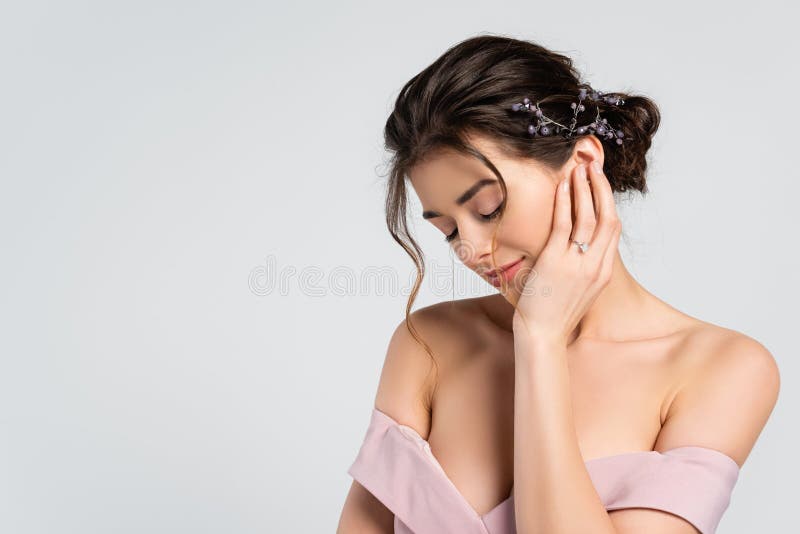 sensual fiancee touching face while posing