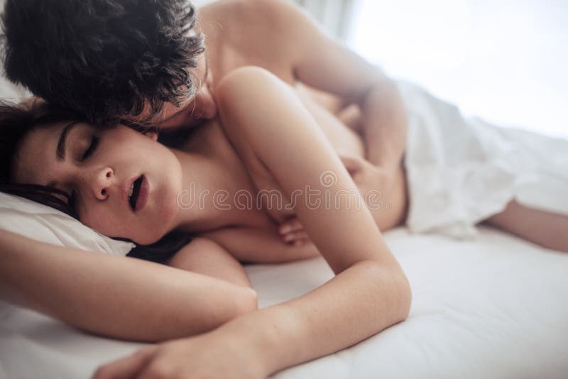Sensual lovers in bed having sex stock images Sensual lovers in bed having sex stock images
