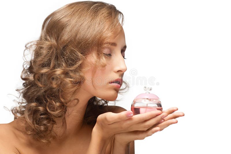 Portrait of young beautiful woman with perfume. Portrait of young beautiful woman with perfume