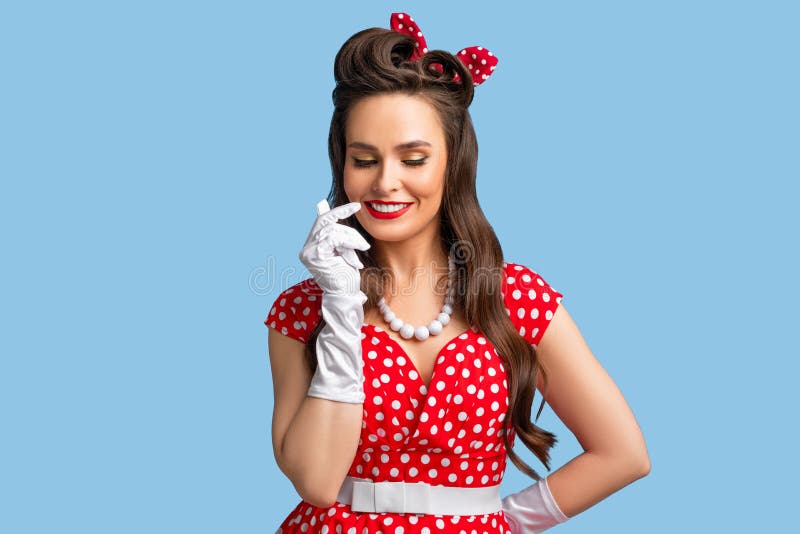 Sensual Young Pinup Woman in Retro Red Polka Dot Dress Touching Her ...
