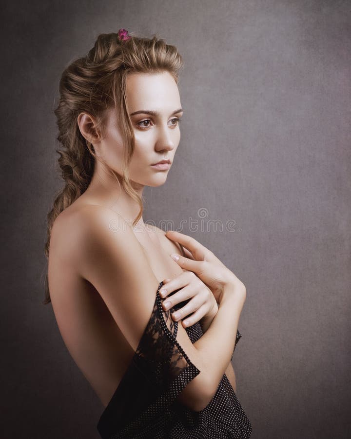 Sensuality. Beauty blonde. Studio female portrait, retro style