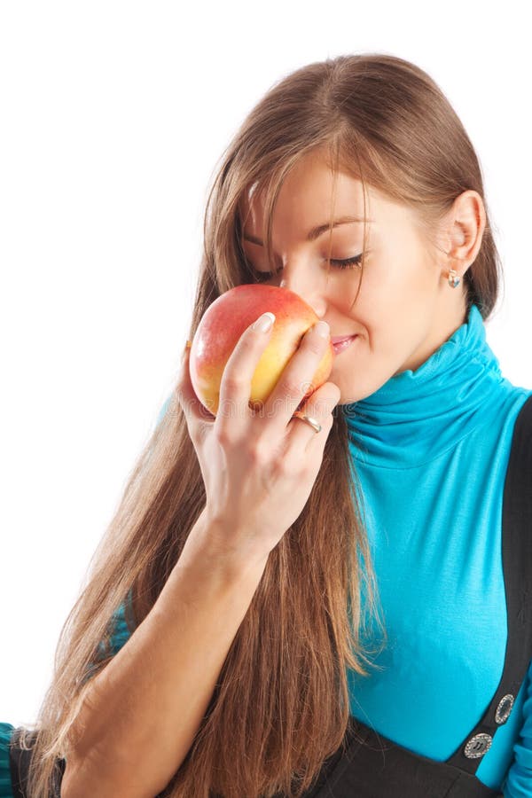 sentir de fille de pomme photo stock sentir de fille de pomme photo stock
