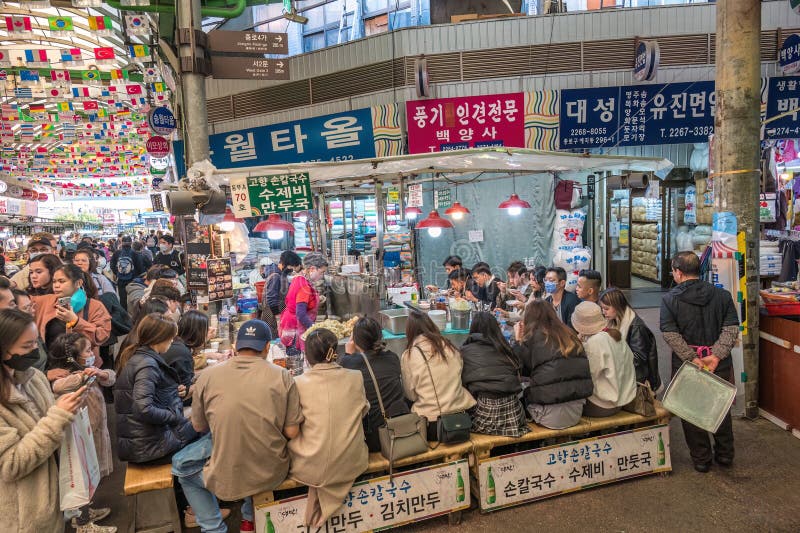Seoul, South Korea Shop and Street Food Stall with Many Tourist at