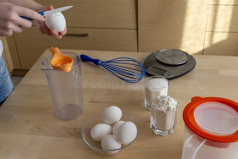 Separating Yellow Yolks from Protein in Raw Eggs for Cake, Biscuit and Cream. Stock Image