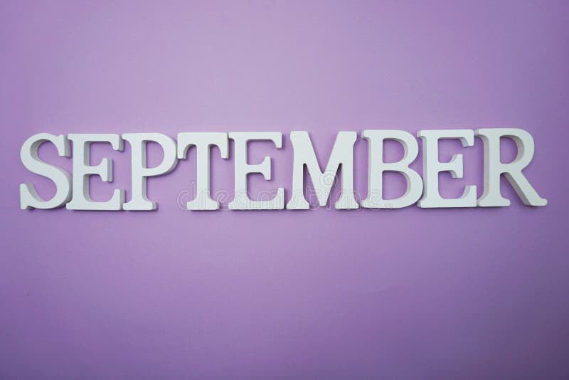 September Alphabet Letter with Space Copy on Purple Background Stock ...