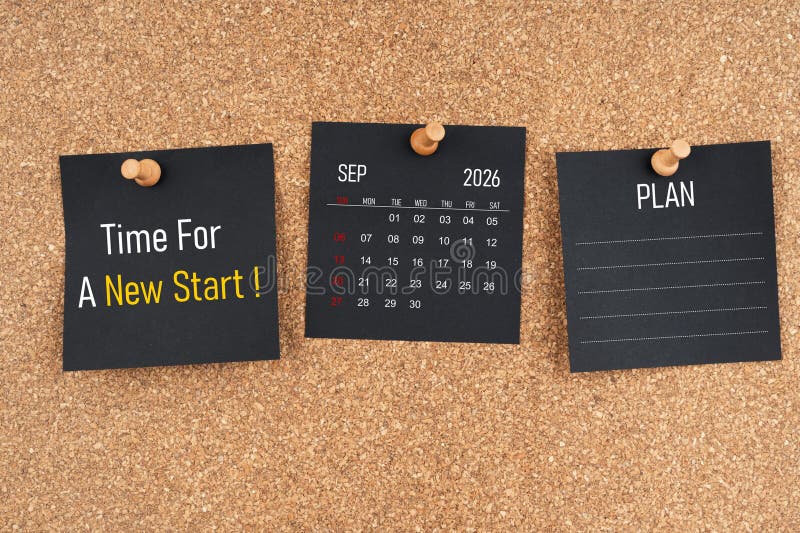 September 2026 calendar with Time for a new start and Plan text on black adhesive notes with wooden stock photography