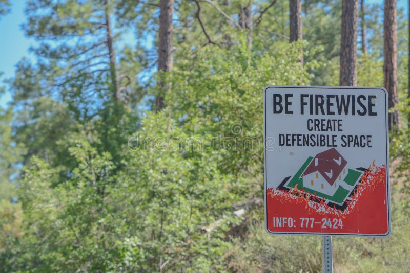 Be Firewise and Create Defensible Space Sign in Prescott National Forest, Prescott, Arizona. Be Firewise and Create Defensible Space Sign in Prescott National Forest, Prescott, Arizona.