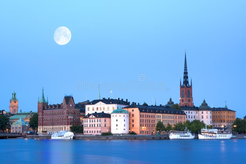 Evening Stockholm with moon. HDR shot. Evening Stockholm with moon. HDR shot.