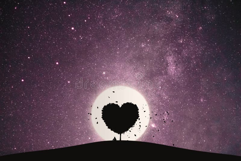 Heart shape of big tree and alone man sitting on a mountain under love tree landscape with fantasy night sky and full moon. Stunning views at lonely nights. Heart shape of big tree and alone man sitting on a mountain under love tree landscape with fantasy night sky and full moon. Stunning views at lonely nights