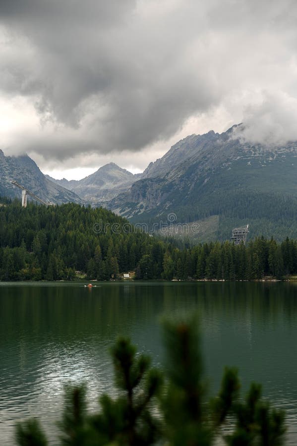Serene Mountain Lake with Forest and Peaks royalty free stock images
