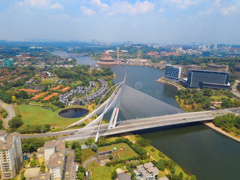 Seri Wawasan Bridge or Putra Bridge and Putrajaya Lake with blue sky. The most famous tourist attraction in Kuala Lumpur City